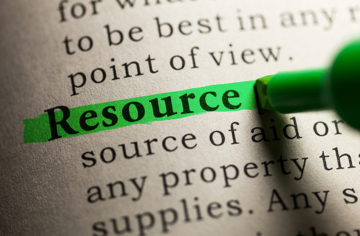 Photo of a book with the word "resource" highlighted.